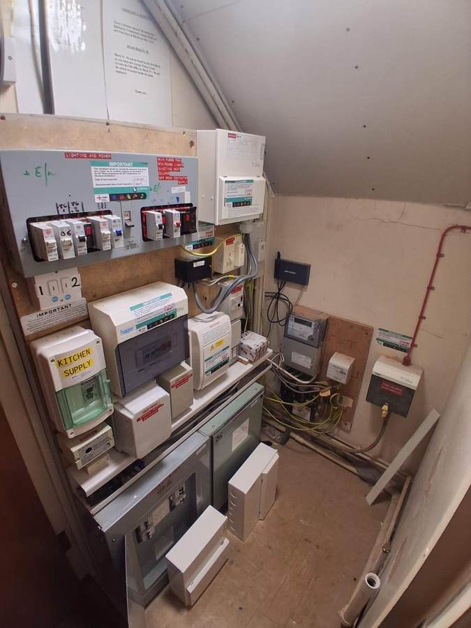 Residential care homes: Communal intake cupboard after the works